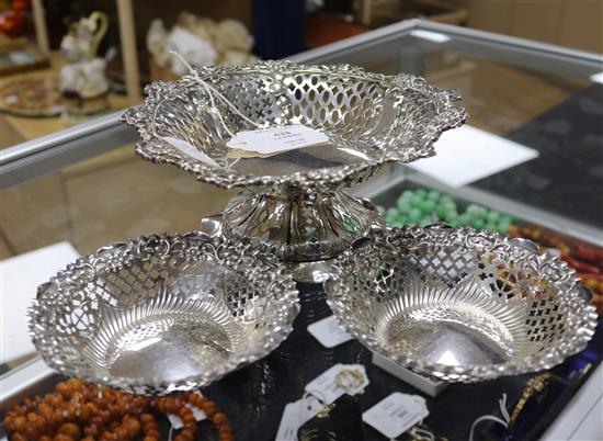 A late Victorian pierced silver pedestal bonbon dish and two smaller bonbon dishes, 11.5 oz.